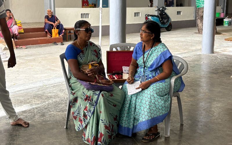 Eye doctors perform eye screening on eye patients at charitable dispensary